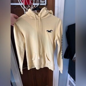 Hollister Pale Yellow Hoodie with Navy Logo